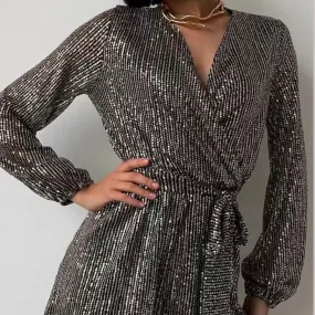 Full Size Sequin Surplice Tie Waist Long Sleeve Romper