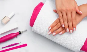 Manicure and/or Pedicure at Toned and Polished